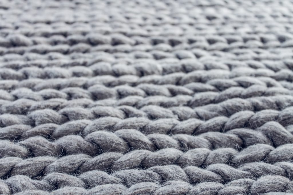 Ever thought about layering your carpet using an area rug?